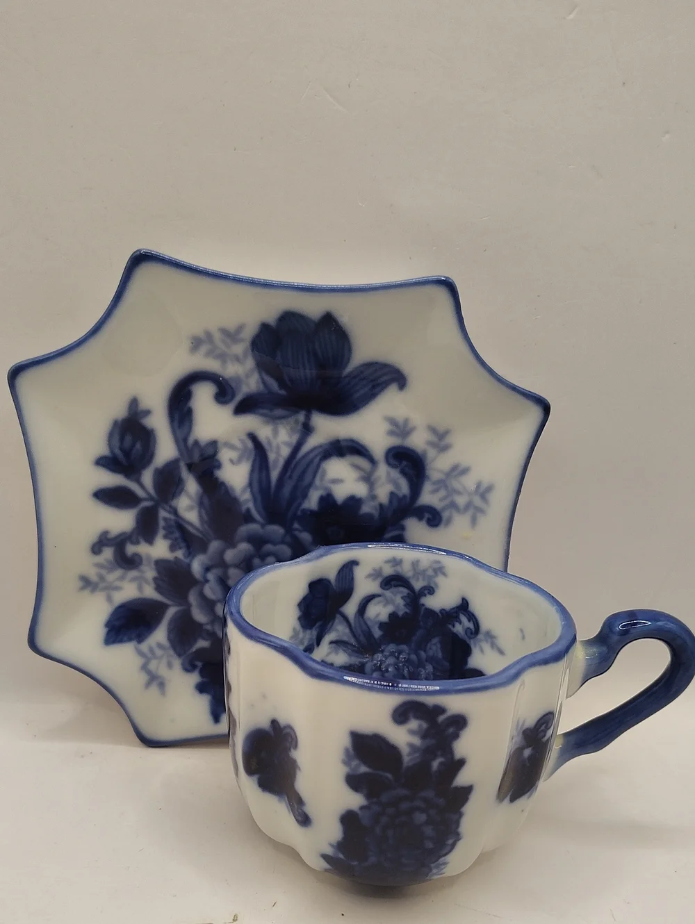 Blue and White Floral Porcelain Teacup with Matching Saucer